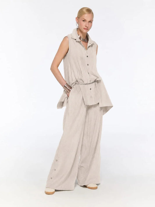 Silver sleeveless buttoned top and trousers set