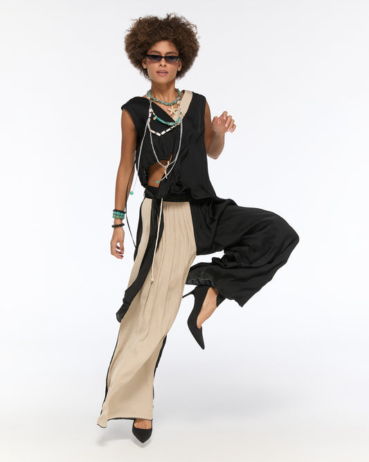 Asymmetrical draped black and beige pleated set