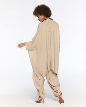 Load image into Gallery viewer, Draped beige oversized shirt and harem-style trousers
