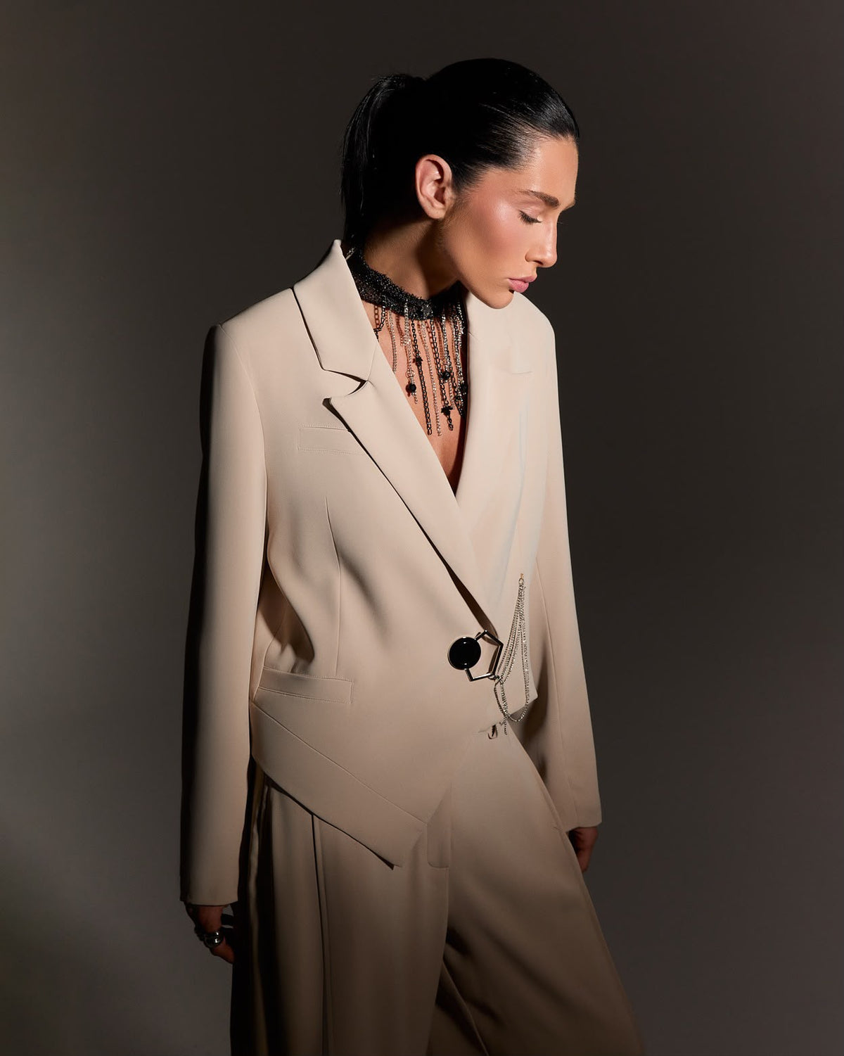 Beige asymmetric blazer and trouser set